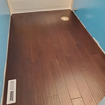 Hardwood-look flooring installed in a bedroom